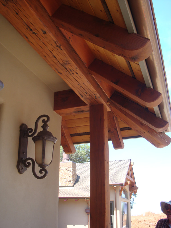 Exterior Overhang Showing Rafters, Post and Beam from Reclaimed Timbers